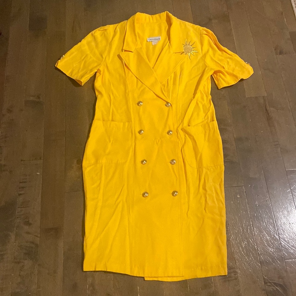 Bright and cheery vintage yellow dress with sun embroidery